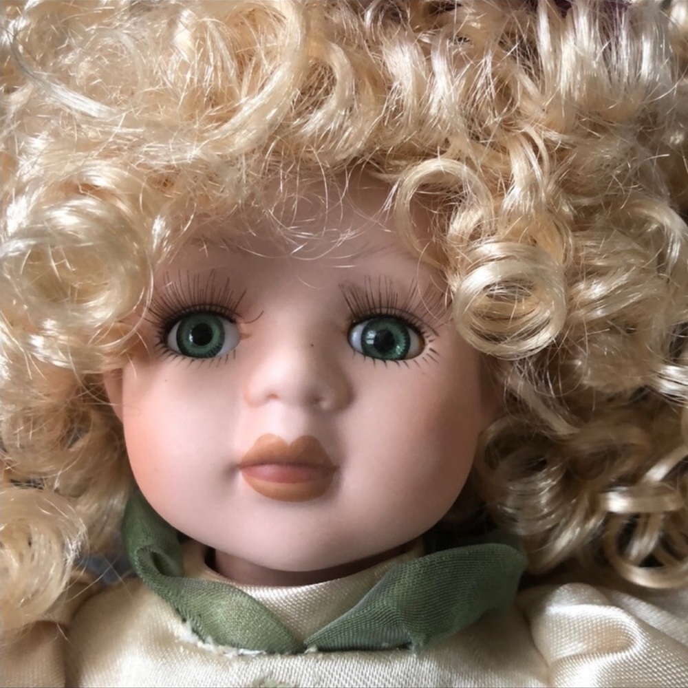 Geppedo porcelain doll